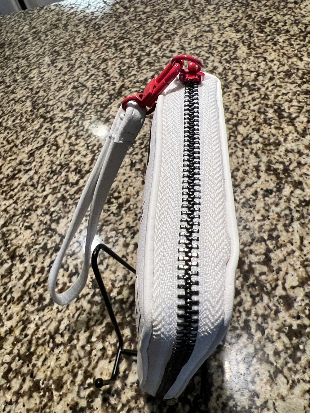 Betsey Johnson White Newspaper Print Wristlet Phone Case with Red Accent - Picture 5 of 7